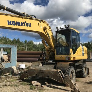 Колесный экскаватор